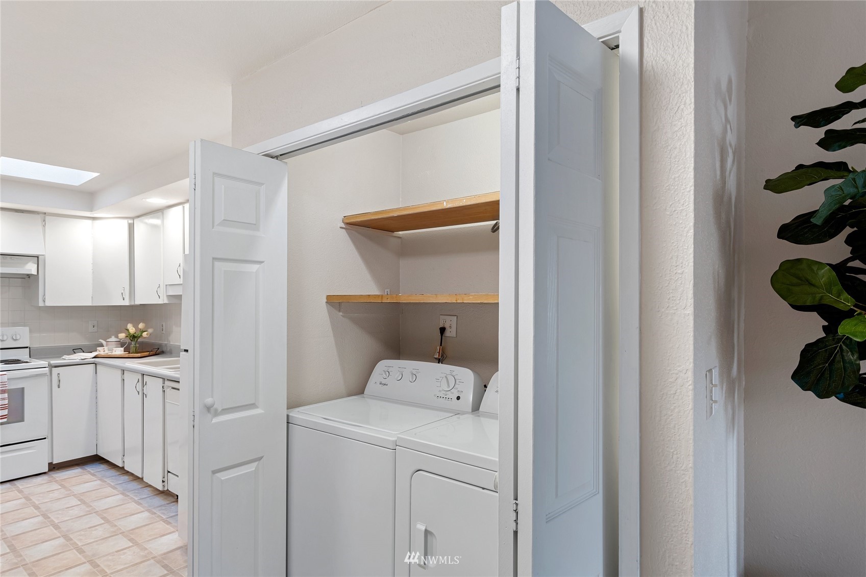 4308 Northeast Sunset Boulevard, Unit O2 Renton, WA 98059 - Photo 18 of 22 a view of a storage and utility room with a window