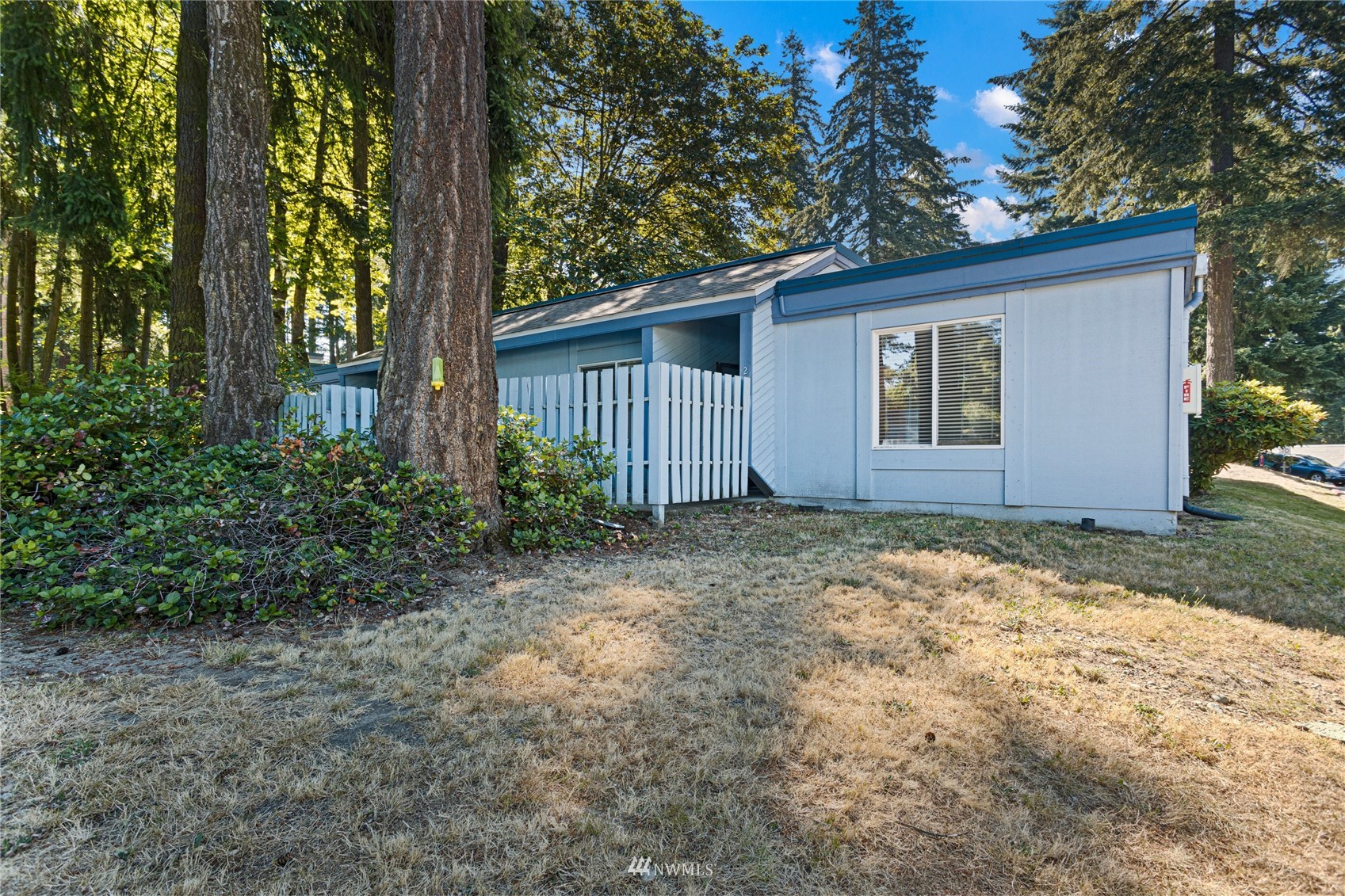 4308 Northeast Sunset Boulevard, Unit O2 Renton, WA 98059 - Photo 22 of 22 a view of a house with a backyard