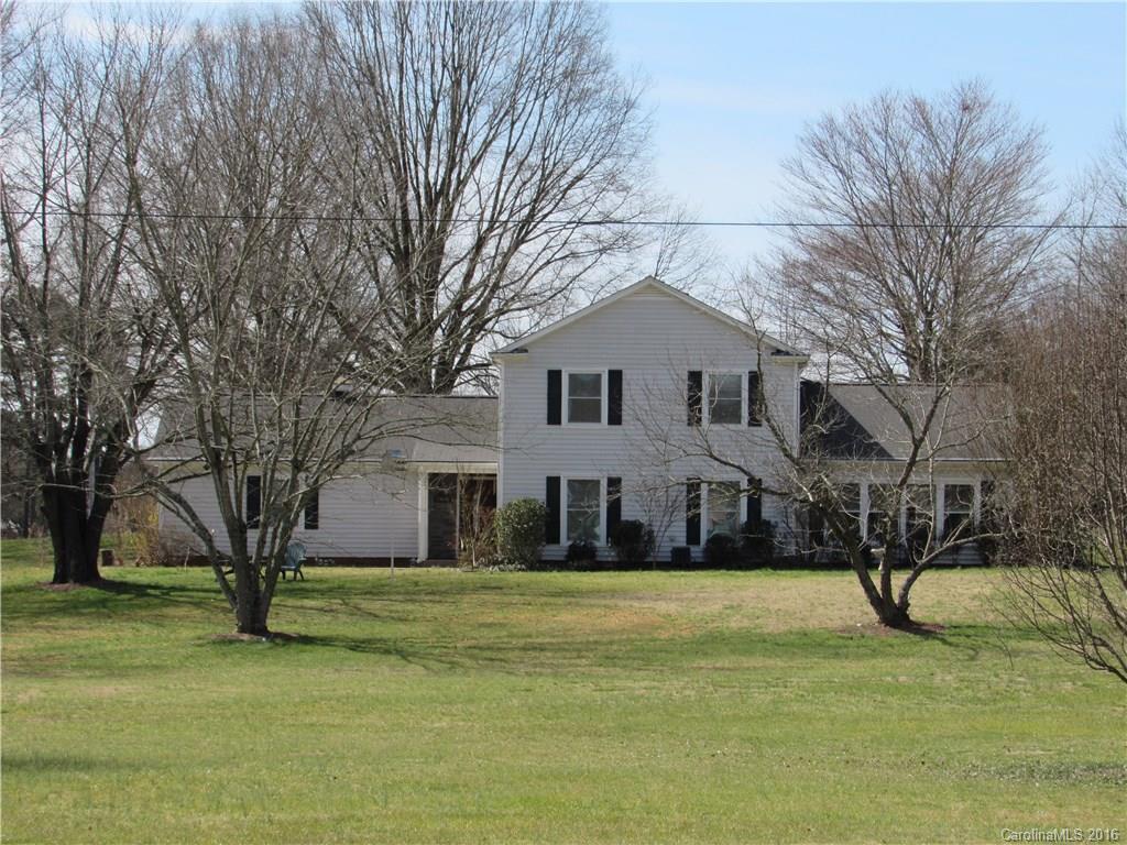 1219 Stevens Road Monroe, NC 28110 - Photo 1 of 24 a front view of a house with a yard