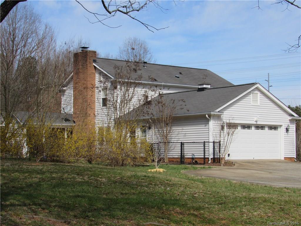 1219 Stevens Road Monroe, NC 28110 - Photo 2 of 24 a front view of a house with a yard