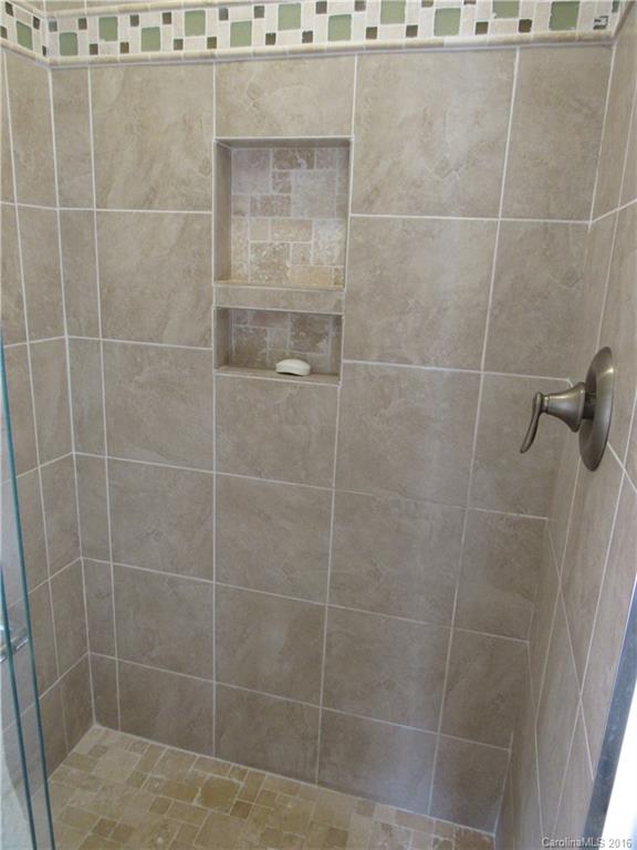 1219 Stevens Road Monroe, NC 28110 - Photo 17 of 24 a bathroom with a shower