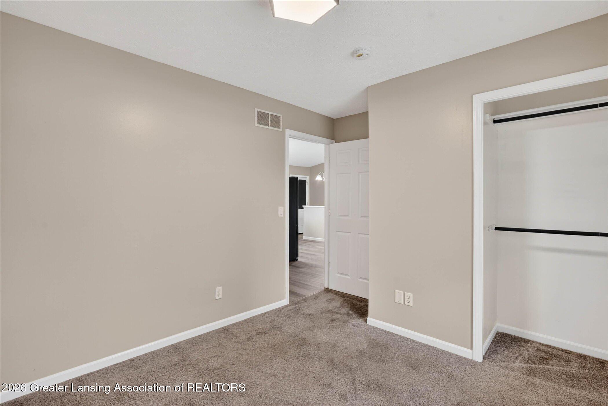 5105 Hughes Road Lansing, MI 48911 - Photo 15 of 26 24-5105-Hughes-Rd-WindowStill-Photograph