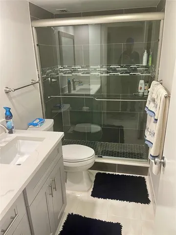 a view of storage and utility room with empty racks