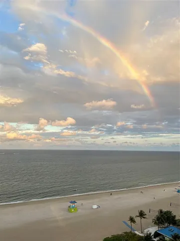 a living room with furniture and window