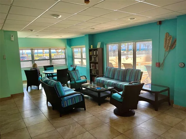 a front view of a building with parking