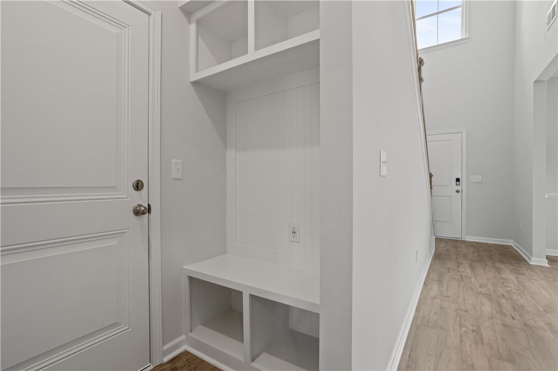 555 Hydrangea Street, Unit LOT 47 Seneca, SC 29678 - Photo 10 of 38 A well-appointed mudroom area includes a built-in bench and shelving for optimal organization.