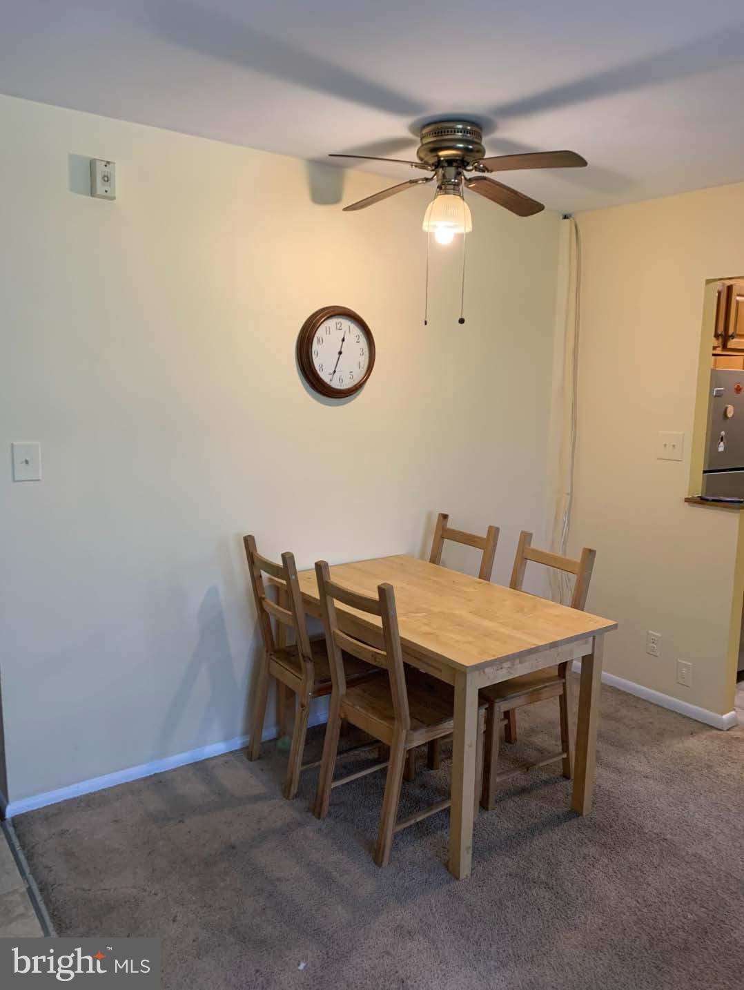4330 Hartwick Road, Unit 211 College Park, MD 20740 - Photo 3 of 13 Cozy dining nook with warm ambiance.