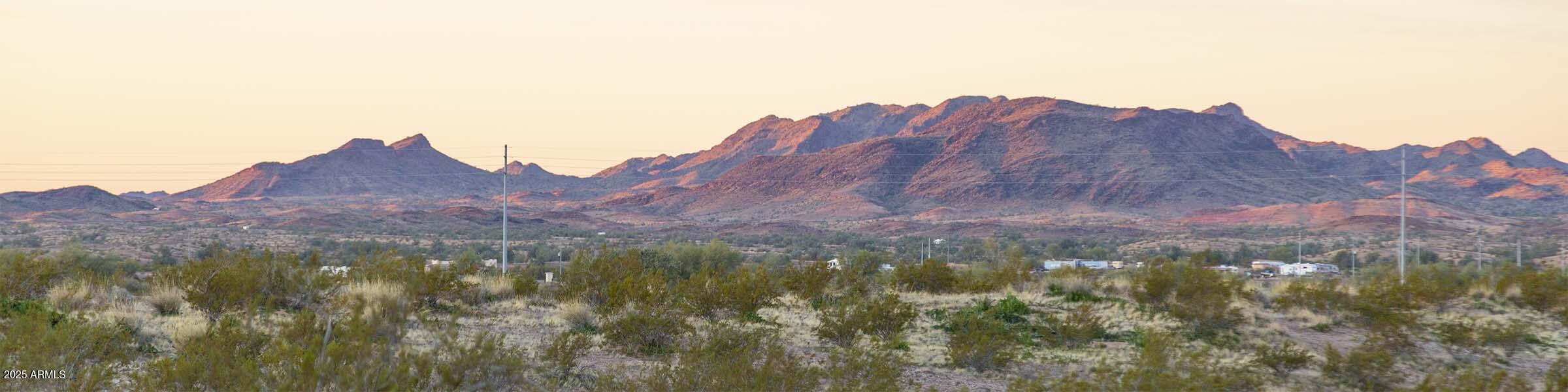 2602 South Sd Forest Bouse, AZ 85325 - Photo 4 of 4 a view of a house with a green field