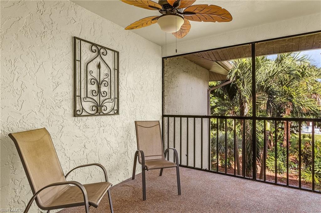 1765 Courtyard Way, Unit C202 Naples, FL 34112 - Photo 18 of 25 Unfurnished sunroom featuring a ceiling fan and a balcony