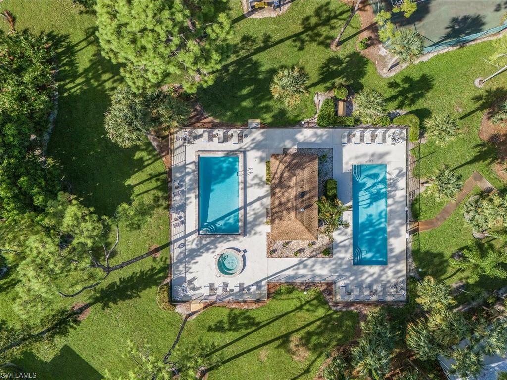 1765 Courtyard Way, Unit C202 Naples, FL 34112 - Photo 23 of 25 Aerial view of a pool