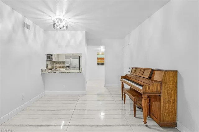 a view of a hallway with entryway