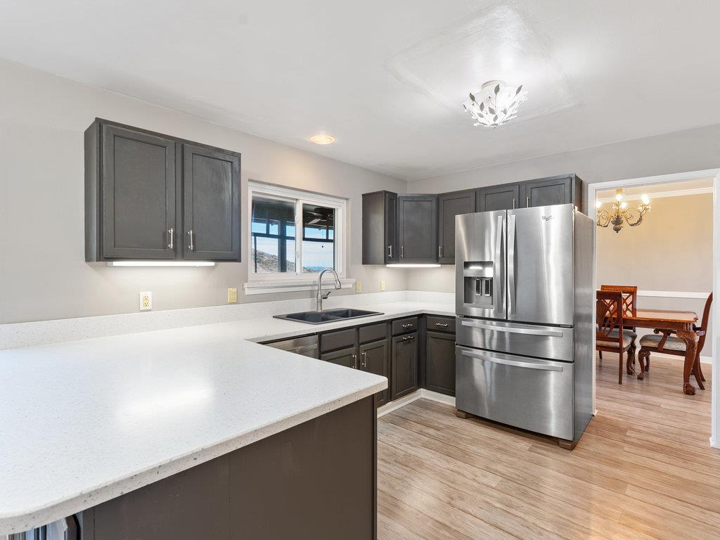 63155 Argyle Road King City, CA 93930 - Photo 17 of 46 a kitchen with a refrigerator and a sink