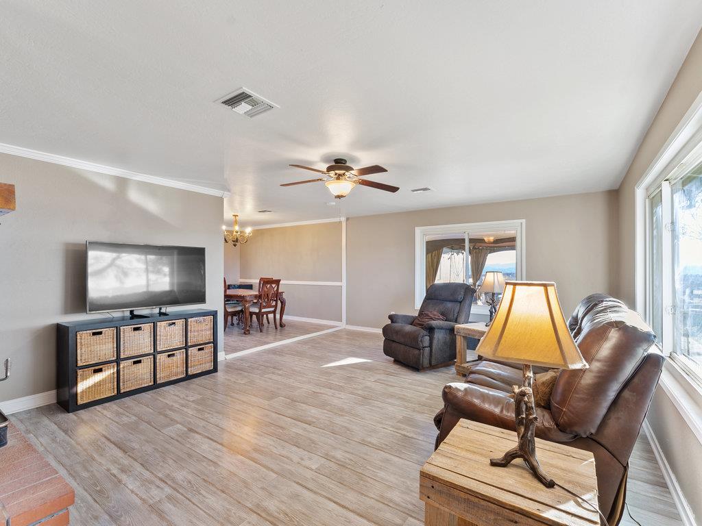 63155 Argyle Road King City, CA 93930 - Photo 21 of 46 a living room with furniture and a flat screen tv