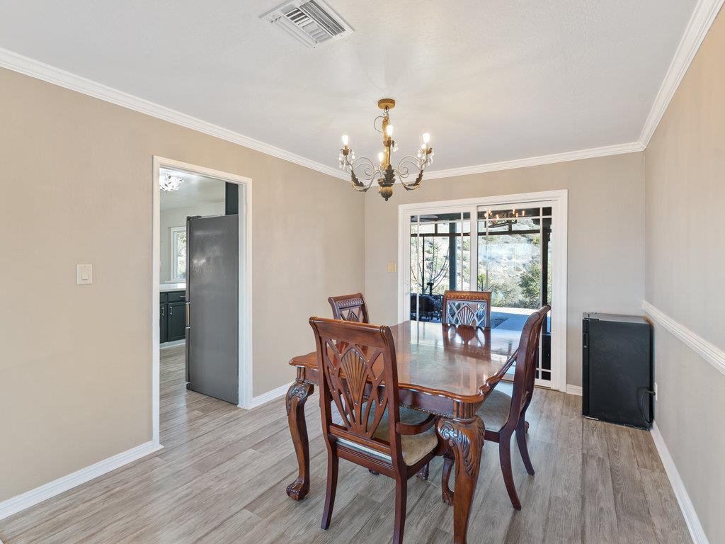 63155 Argyle Road King City, CA 93930 - Photo 23 of 46 a view of a dining room with furniture window and wooden floor