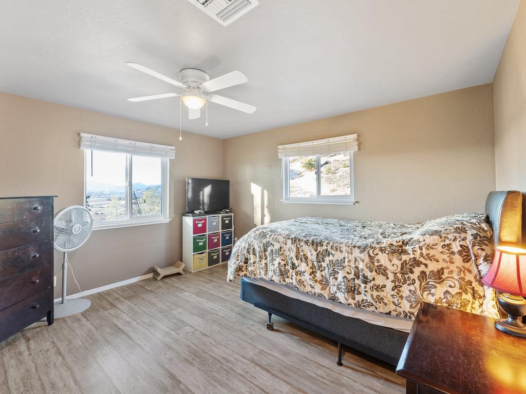 63155 Argyle Road King City, CA 93930 - Photo 27 of 46 a bed sitting in a bedroom next to a window