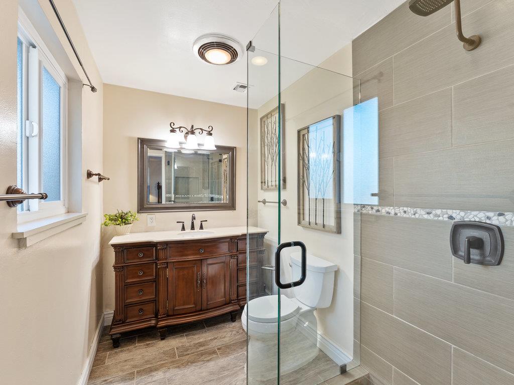 63155 Argyle Road King City, CA 93930 - Photo 32 of 46 a bathroom with a sink double vanity and a mirror