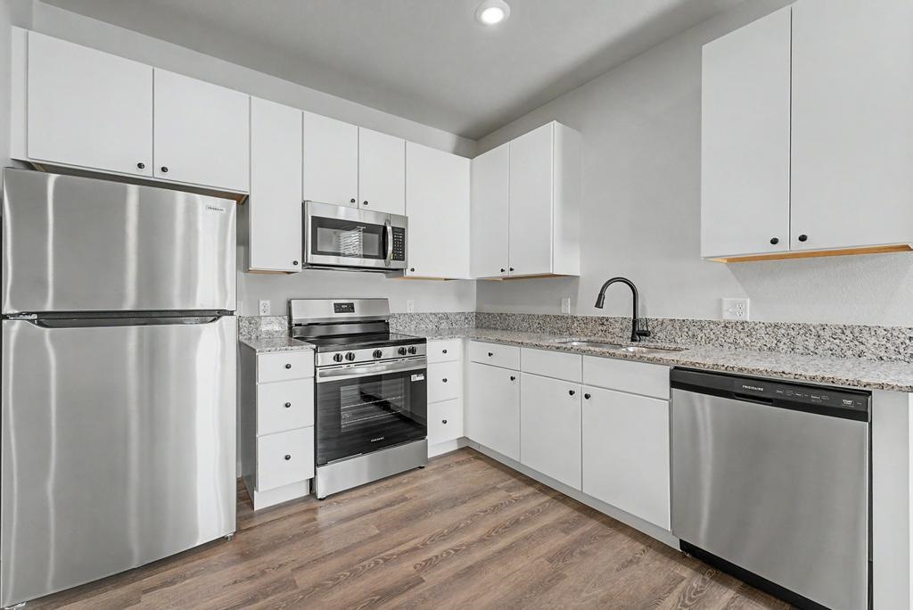 845 North Rupple Road, Unit 202 Fayetteville, AR 72704 - Photo 6 of 21 Like unit with finishes representative of the complex