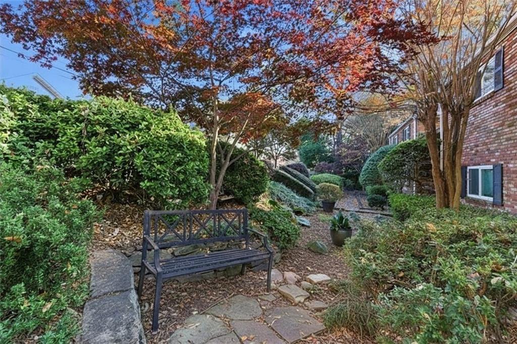 343 8th Street Northeast, Unit T1 Atlanta, GA 30309 - Photo 26 of 33 a wooden bench with some trees