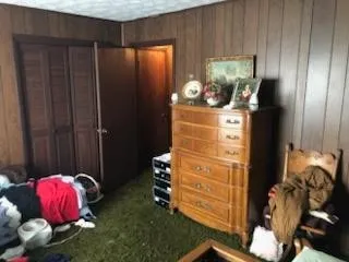 a view of a livingroom with furniture and toys