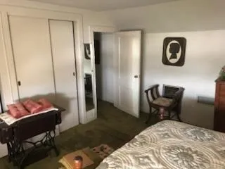 a view of wooden floor and a window