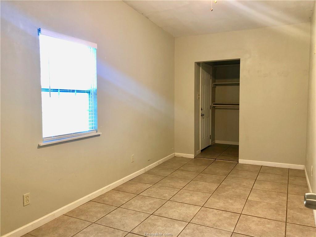 807 Vine Street Bryan, TX 77802 - Photo 11 of 17 a view of an empty room with window