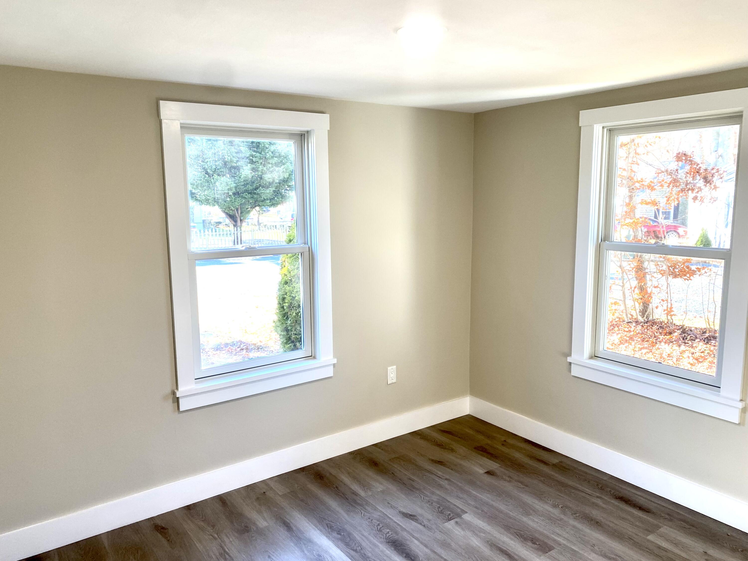 5 General Patton Drive Hyannis, MA 02601 - Photo 30 of 66 a view of an empty room with wooden floor and a window