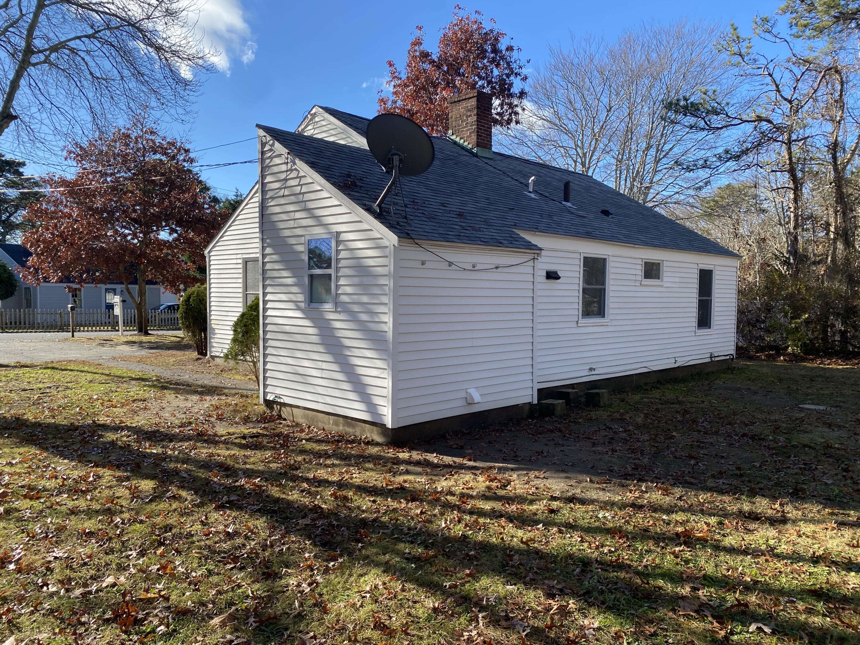 5 General Patton Drive Hyannis, MA 02601 - Photo 36 of 66 a view of a house with a yard
