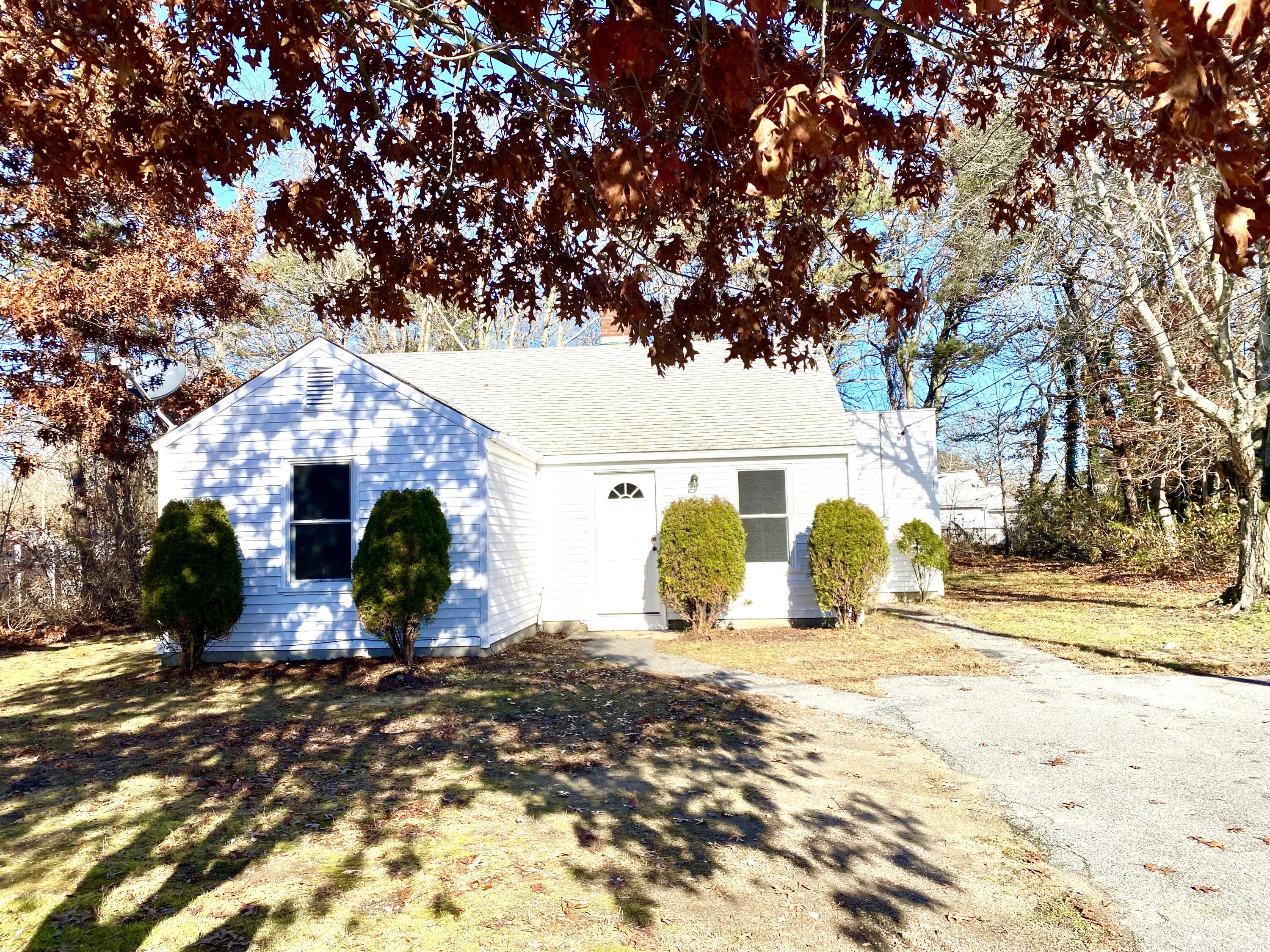 5 General Patton Drive Hyannis, MA 02601 - Photo 45 of 66 a view of a house with snow on the tree