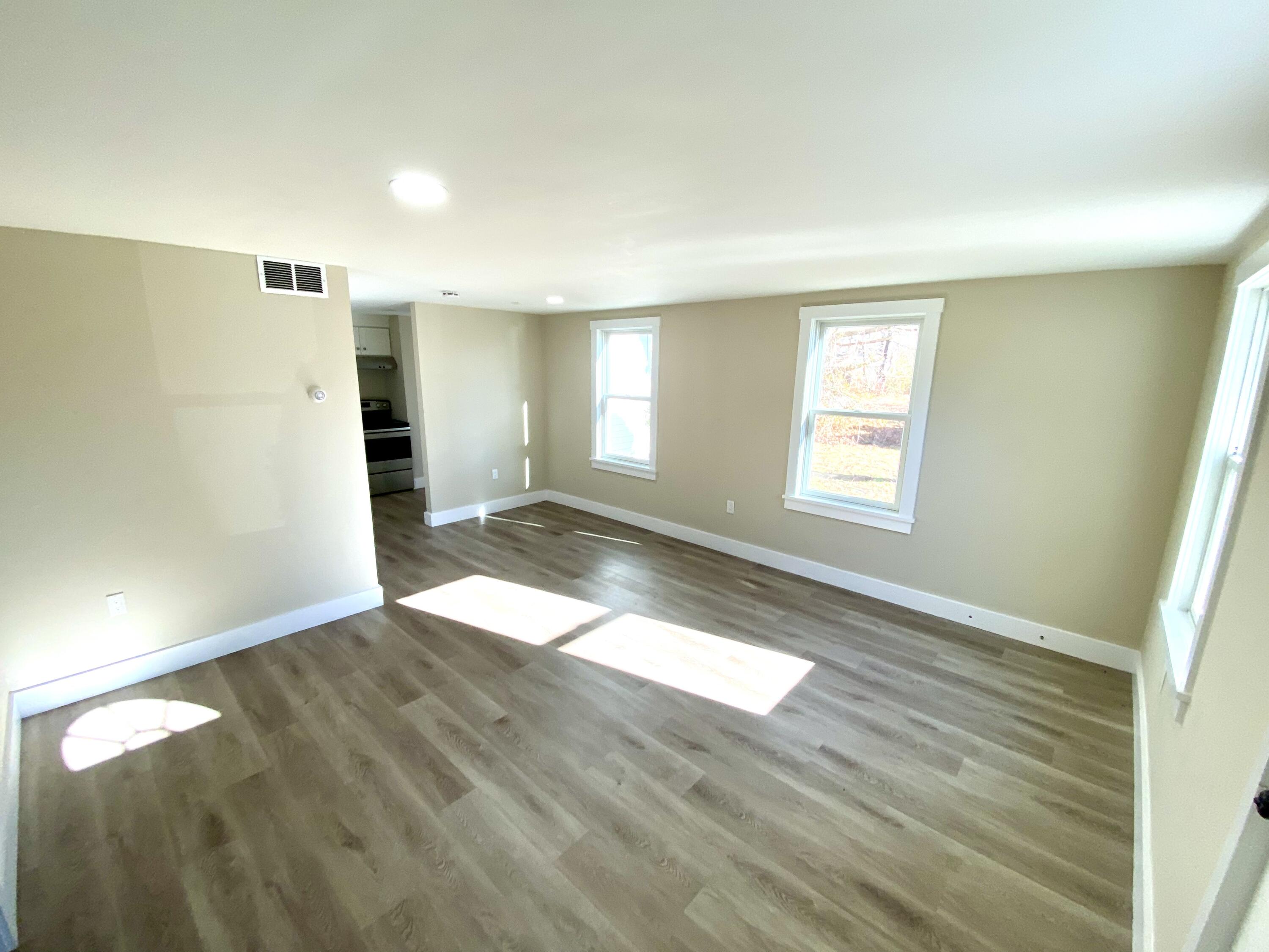 5 General Patton Drive Hyannis, MA 02601 - Photo 54 of 66 a view of empty room with wooden floor and fan
