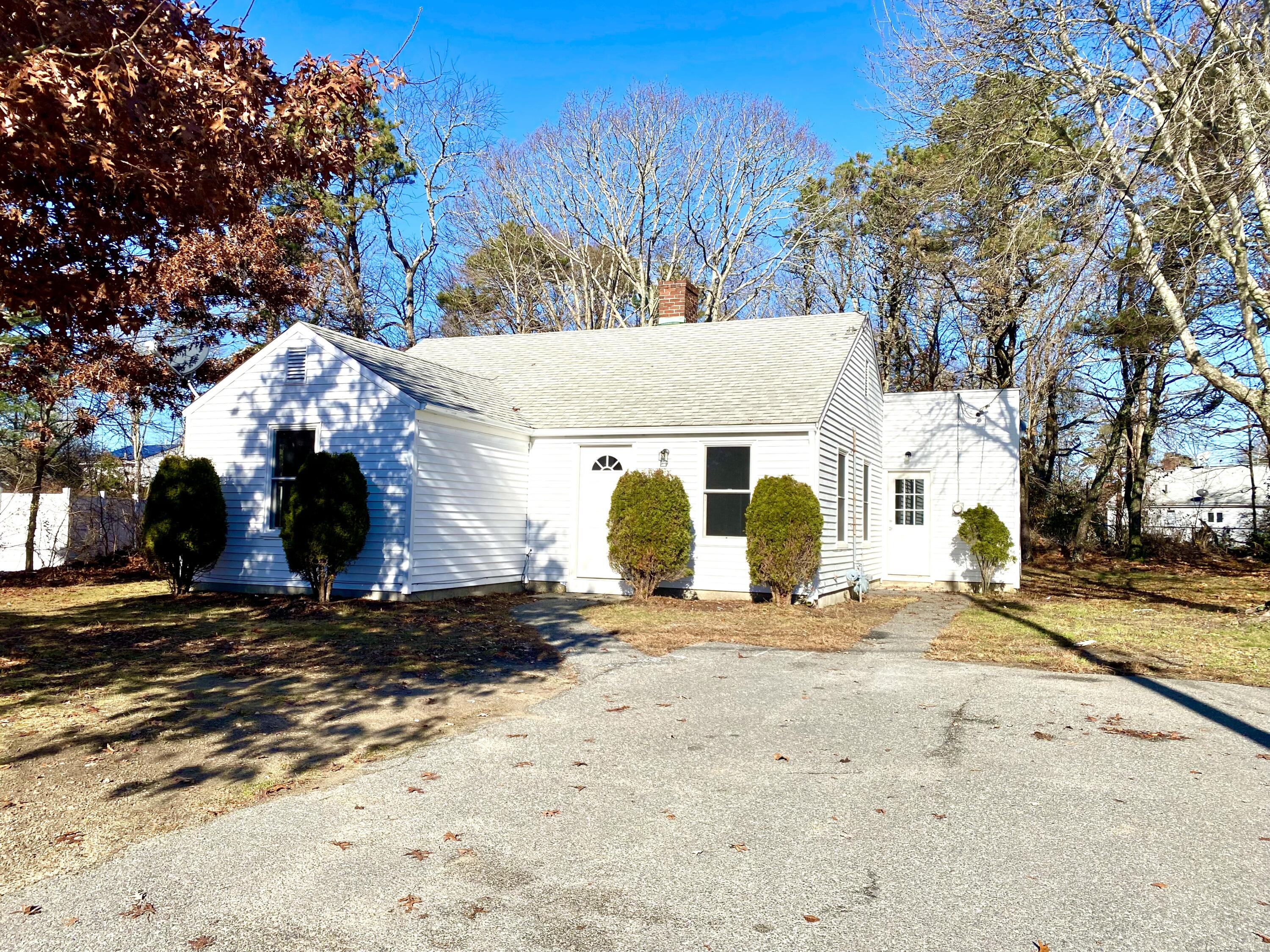 5 General Patton Drive Hyannis, MA 02601 - Photo 65 of 66 a view of a house with snow on the tree