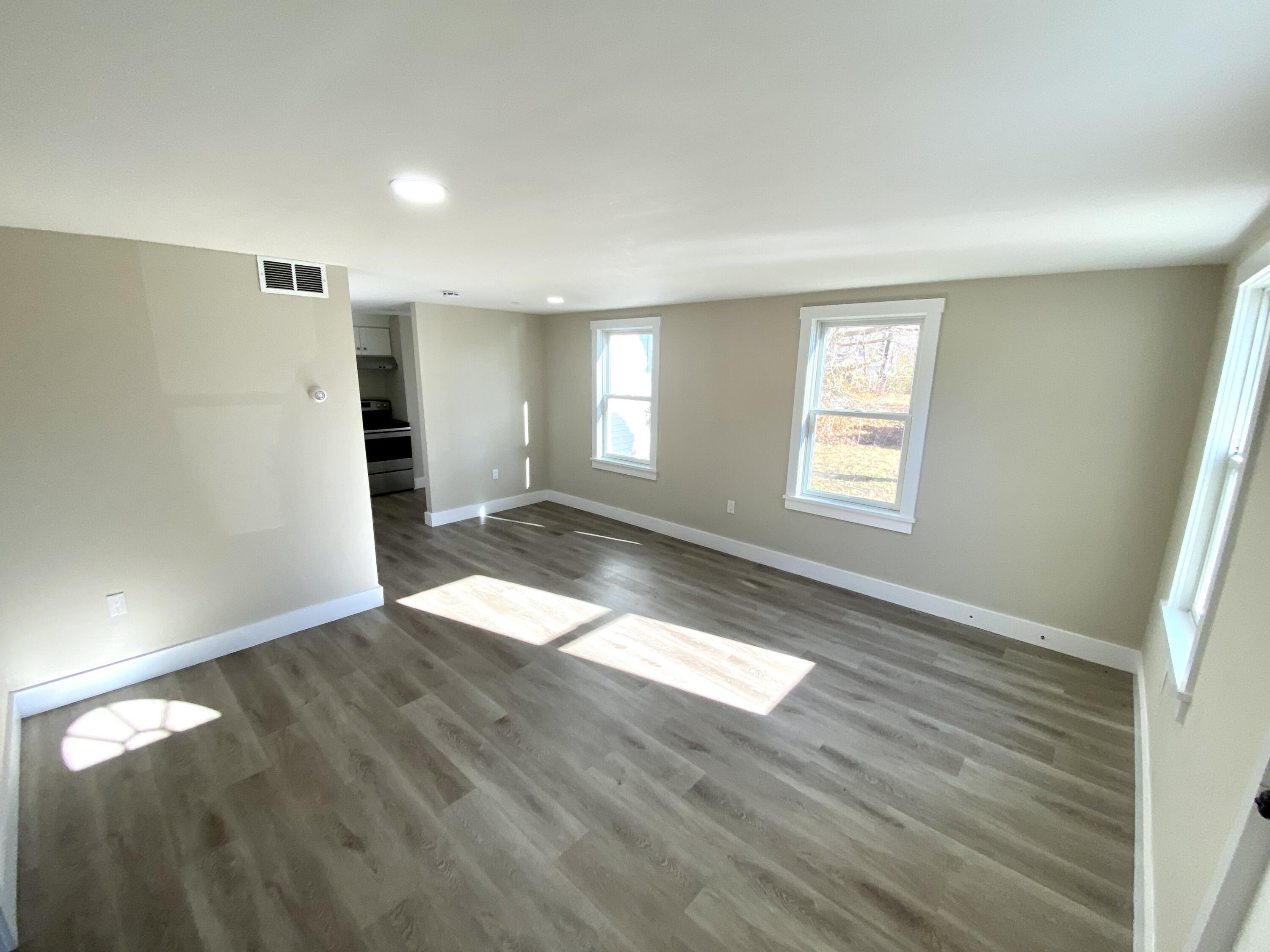 5 General Patton Drive Hyannis, MA 02601 - Photo 9 of 66 a view of empty room with wooden floor and fan