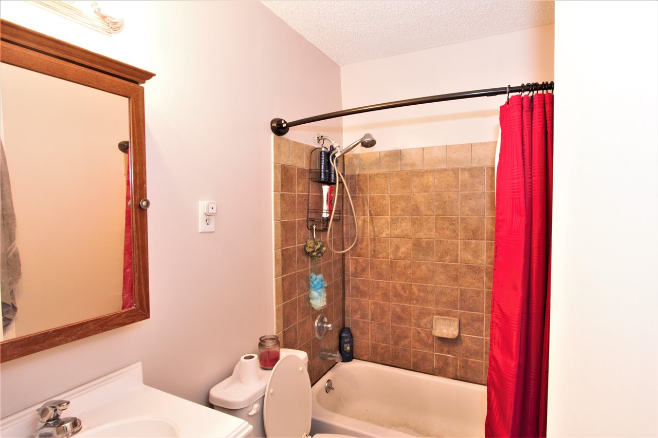 1783 Sea Isle Road Memphis, TN 38117 - Photo 13 of 20 a bathroom with a sink and shower