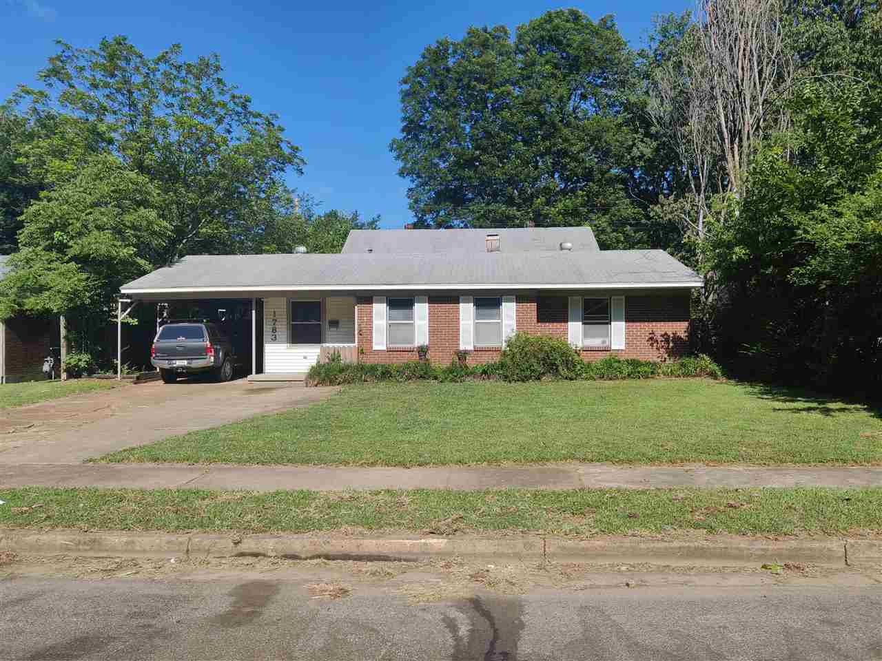 1783 Sea Isle Road Memphis, TN 38117 - Photo 20 of 20 a front view of a house with a yard