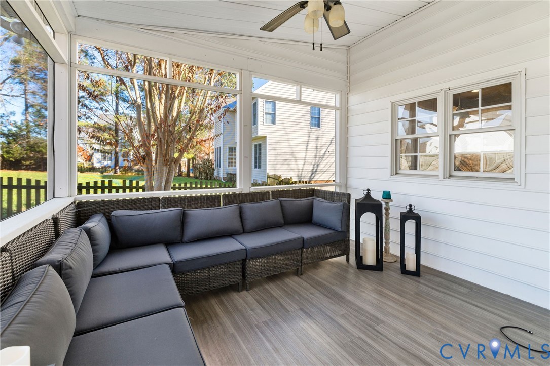 12008 Wheat Ridge Court Glen Allen, VA 23059 - Photo 33 of 36 a living room with furniture and a large window