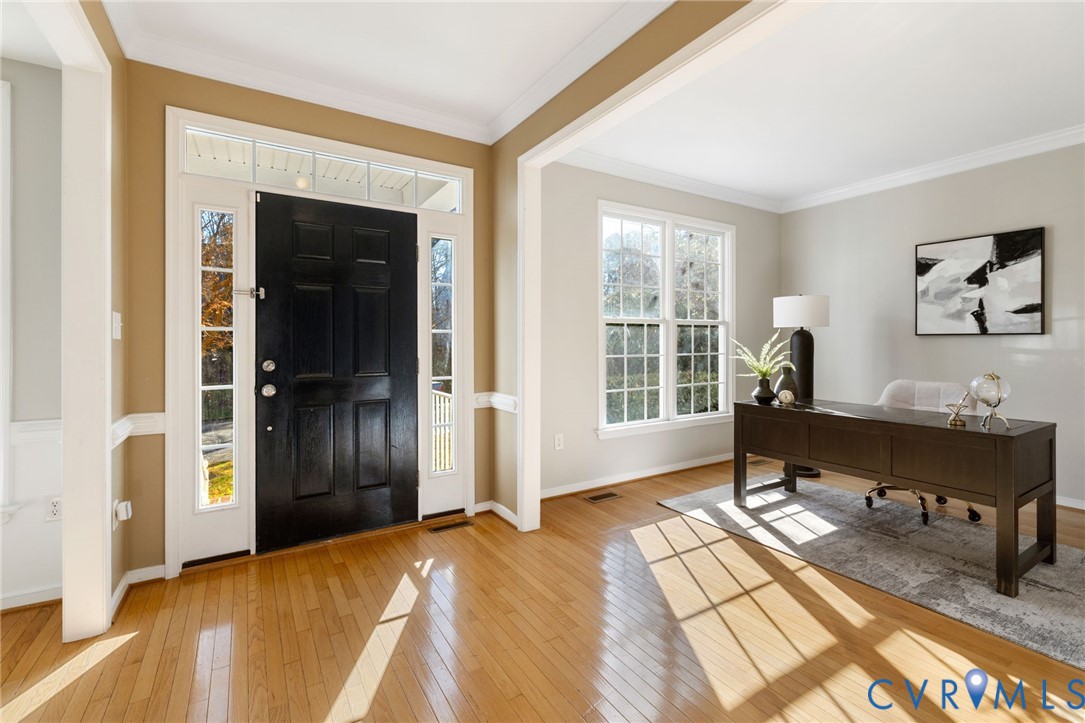 12008 Wheat Ridge Court Glen Allen, VA 23059 - Photo 4 of 36 a bedroom with a bed and a window