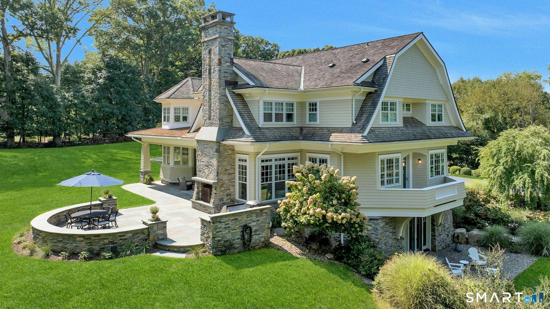 80 Compo Road North Westport, CT 06880 - Photo 3 of 40 a view of a house with a yard and potted plants