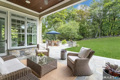 a outdoor living space with furniture and garden view