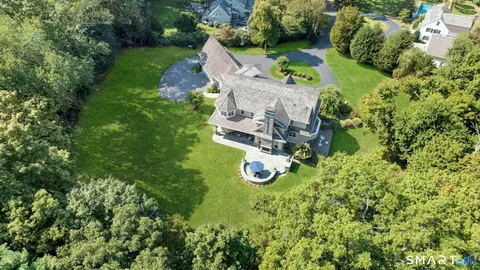 an aerial view of a house with a garden