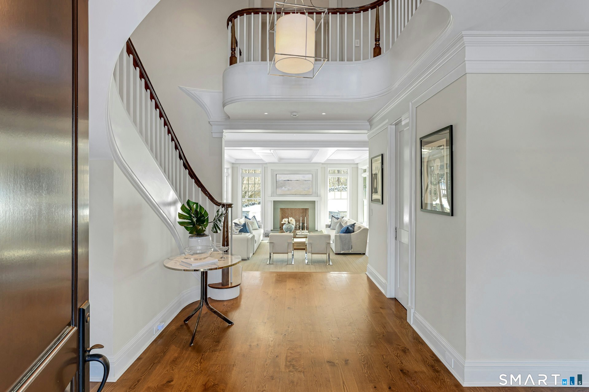 80 Compo Road North Westport, CT 06880 - Photo 6 of 40 a living room with furniture and a chandelier