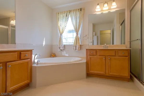 a room with a sink and a mirror