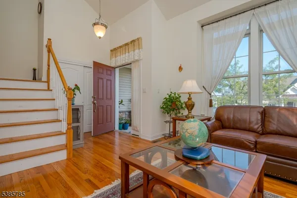 a living room with furniture and a table
