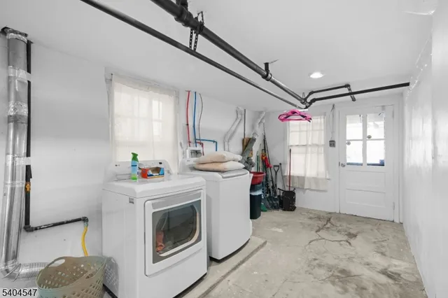 a kitchen with refrigerator and window