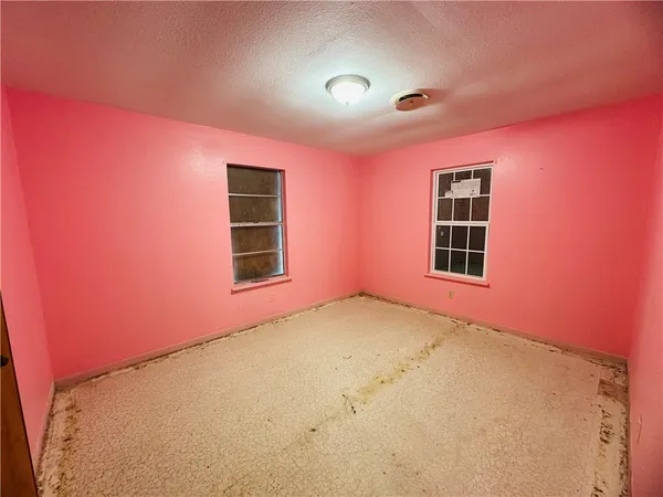 a view of empty room with a window