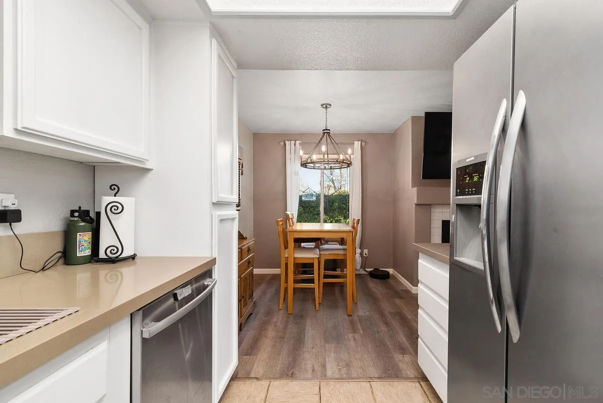13975 Midland Road Poway, CA 92064 - Photo 14 of 33 a kitchen with stainless steel appliances granite countertop a refrigerator and a sink