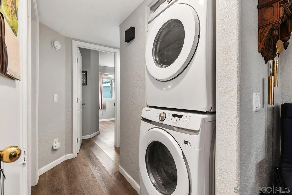 13975 Midland Road Poway, CA 92064 - Photo 15 of 33 a view of a hallway with washer and dryer
