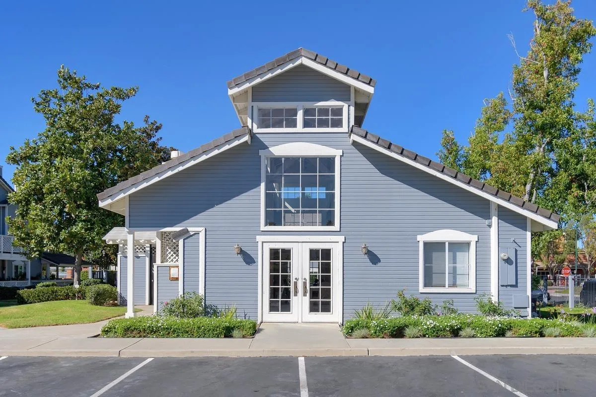 13975 Midland Road Poway, CA 92064 - Photo 26 of 33 a front view of a house with a yard and garage
