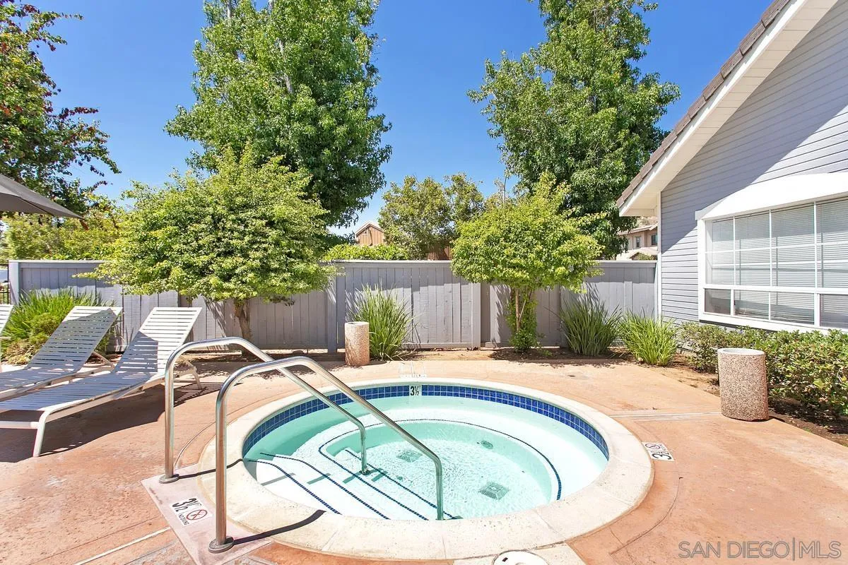 13975 Midland Road Poway, CA 92064 - Photo 31 of 33 a small pool with a outdoor seating and trees