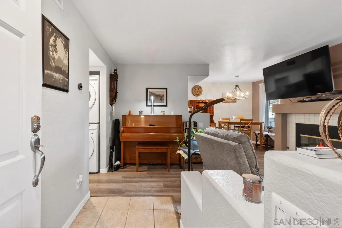 13975 Midland Road Poway, CA 92064 - Photo 5 of 33 a living room with furniture and a flat screen tv