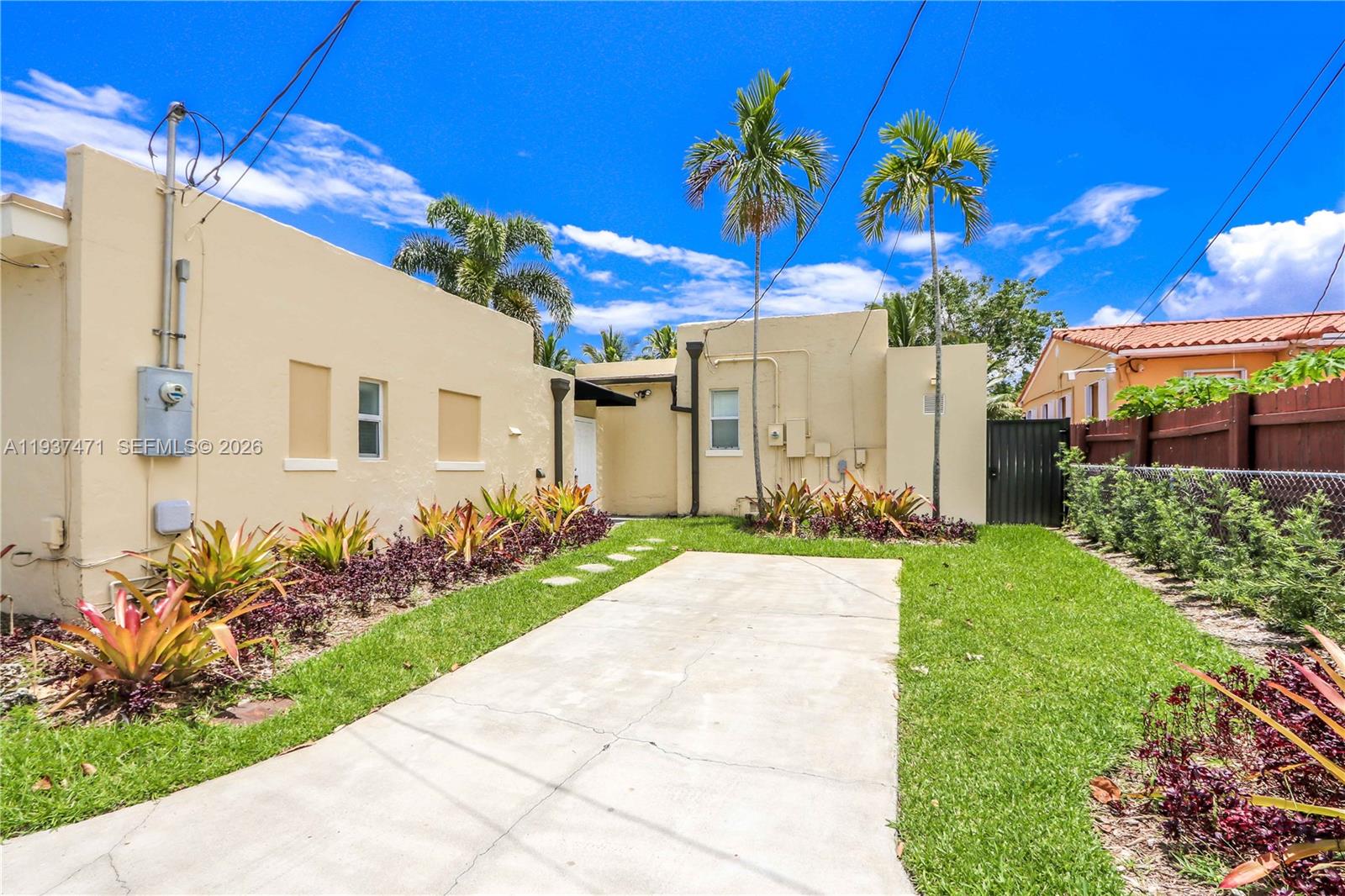 2477 Southwest 22nd Terrace Miami, FL 33145 - Photo 5 of 14 a view of a house with potted plants
