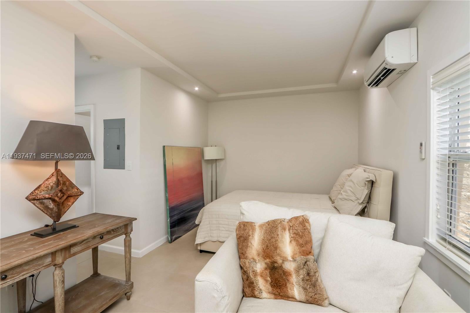 2477 Southwest 22nd Terrace Miami, FL 33145 - Photo 7 of 14 a bedroom with a bed and wooden floor